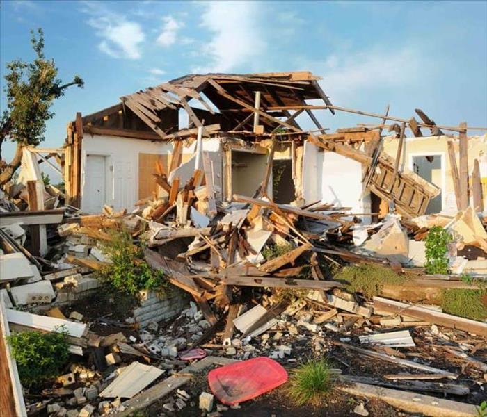a house severely damaged by a tornado