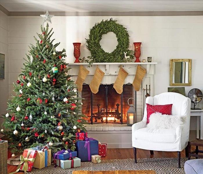 Living room with fire place and Christmas decorations